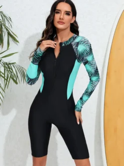 rashguard à manches longues raglan à imprimé palmiers et fermeture éclair sur le devant