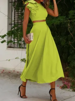 Robe cocktail élégante deux pièces longueur thé col rond plissée