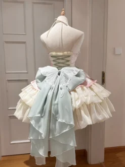 Robe courte Fairy Lolita sans manches en tulle rose abricot à volants et nœud avec traîne.