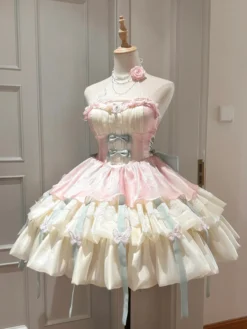 Robe courte Fairy Lolita sans manches en tulle rose abricot à volants et nœud avec traîne.