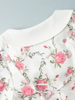 Robe courte à imprimé floral manches bouffantes col Claudine et lacets dans le dos été 2026