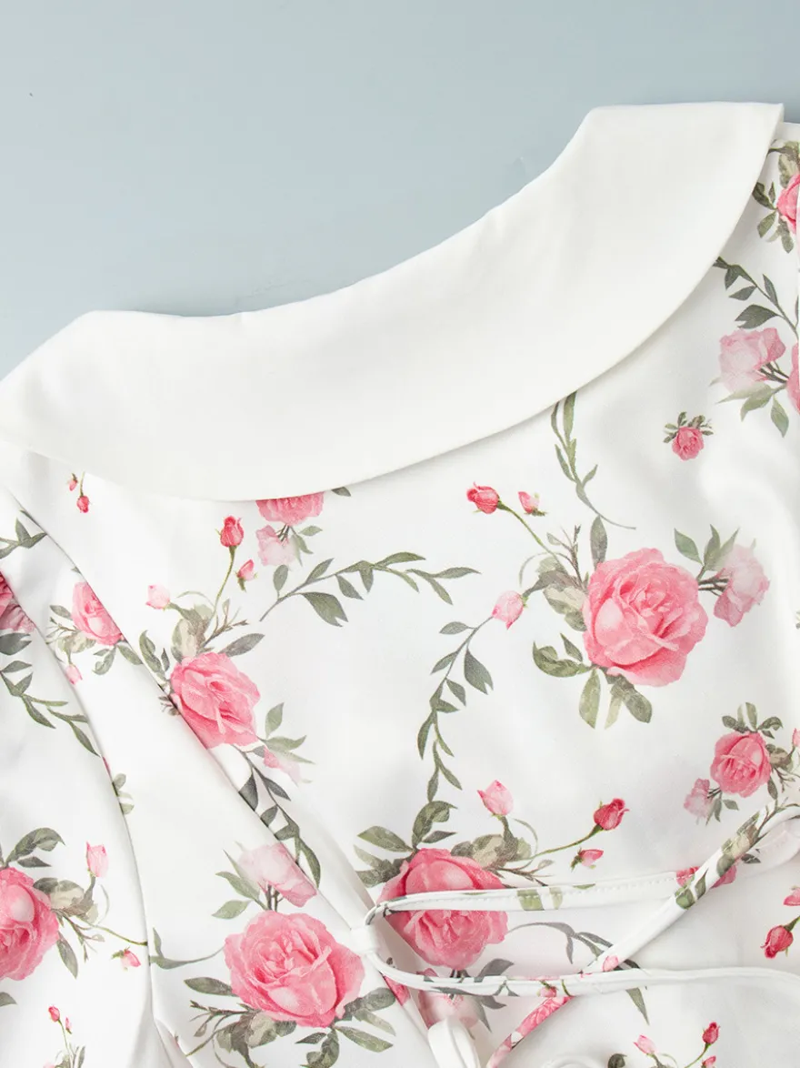 Robe courte à imprimé floral manches bouffantes col Claudine et lacets dans le dos été 2026
