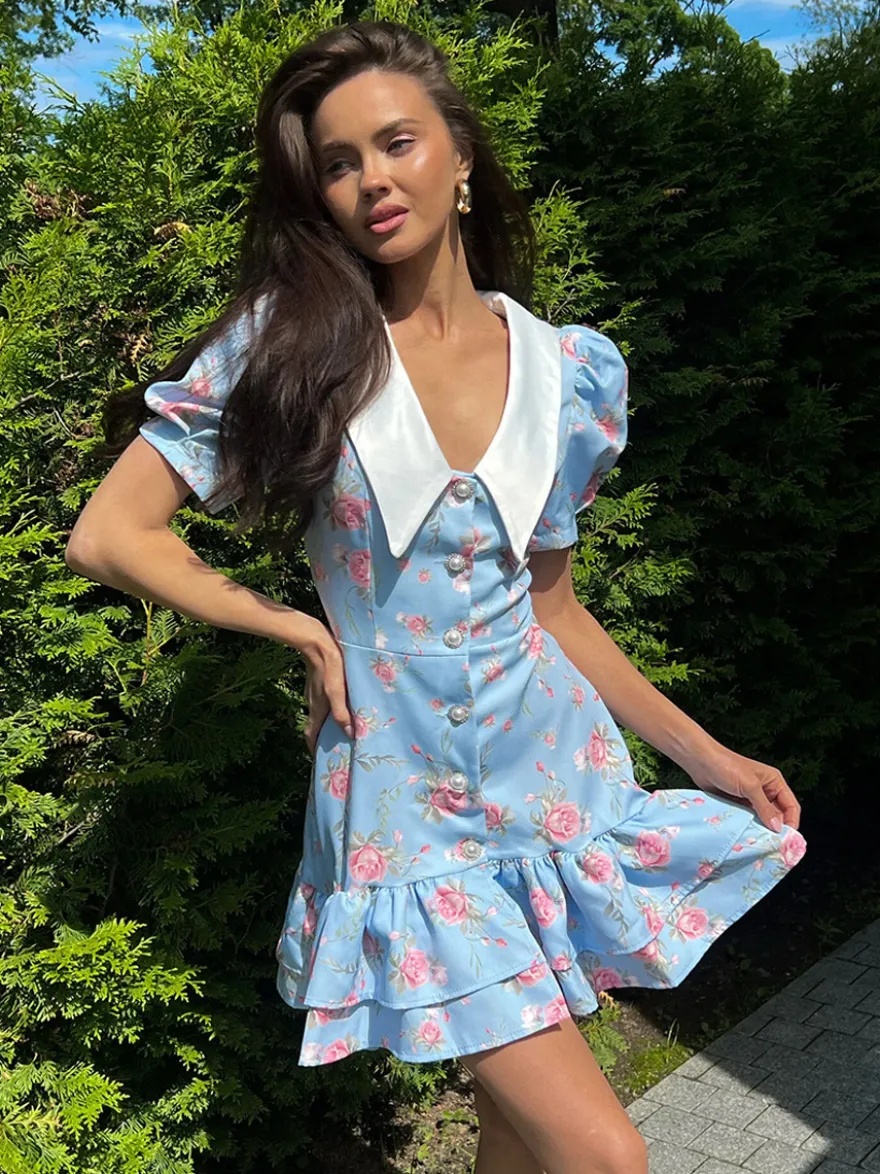 Robe courte à imprimé floral manches bouffantes col Claudine et lacets dans le dos été 2026