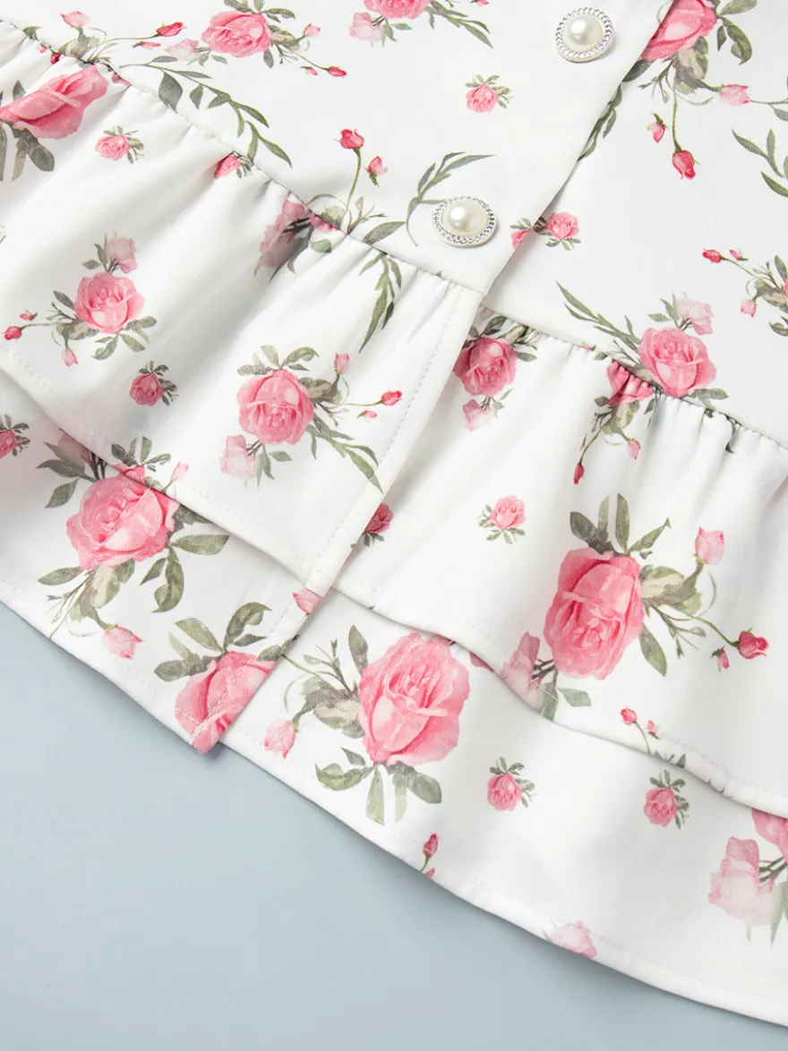 Robe courte à imprimé floral manches bouffantes col Claudine et lacets dans le dos été 2026
