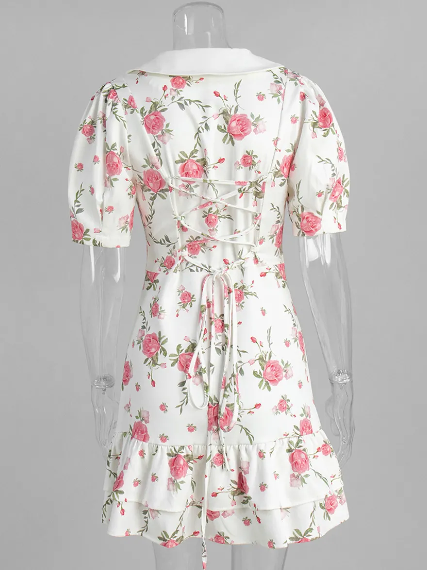 Robe courte à imprimé floral manches bouffantes col Claudine et lacets dans le dos été 2026