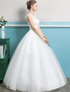 Robe de bal Princesse 2026 robes de mariée tulle dos nu ivoire perles longueur plancher robe de mariée