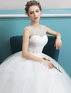 Robe de bal Princesse 2026 robes de mariée tulle dos nu ivoire perles longueur plancher robe de mariée