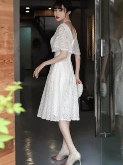 Robe de cocktail Robe de soirée moderne en dentelle à col en V et longueur thé