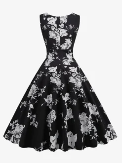 Robe de cocktail vintage années 50 col en V sans manches imprimé floral coupe trapèze taille haute sans manches.