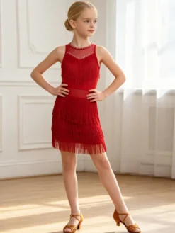 Robe de danse latine pêche pour fille en polyester avec franges élégantes. Tenue de danse latine.