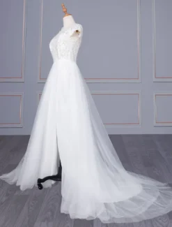Robe de mariéé boho col rond manche courte top en dentelle jupe fendue en chiffon