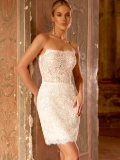 Robe de mariée bohème en mousseline de soie et dentelle deux pièces avec traîne taille naturelle fermeture éclair sans manches décolleté design ivoire