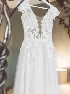 Robe de mariée bohémien ivoire en tulle col V plongeant dos nu jupe fendue robe de mariage