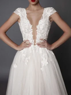 Robe de mariée bohémien ivoire en tulle col V plongeant dos nu jupe fendue robe de mariage