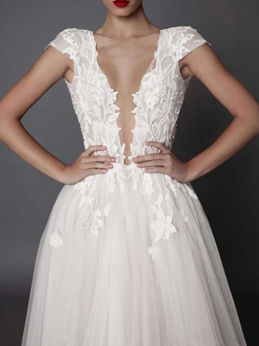 Robe de mariée bohémien ivoire en tulle col V plongeant dos nu jupe fendue robe de mariage