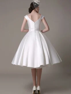 Robe de mariée courte blanche en satin col V avec noeud boutonnée sur dos au genou Robe de mariage vintage