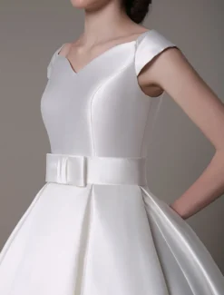 Robe de mariée courte blanche en satin col V avec noeud boutonnée sur dos au genou Robe de mariage vintage
