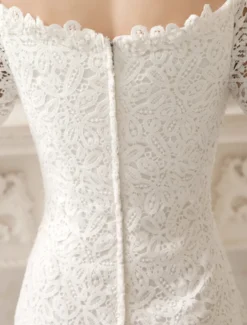 Robe de mariée courte col bateau manche longue zip sur dos en dentelle