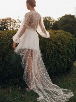 Robe de mariée courte col rond manche longue boutonné sur dos
