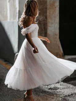 Robe de mariée courte en tulle paillete hors de l'épaule zip sur dos