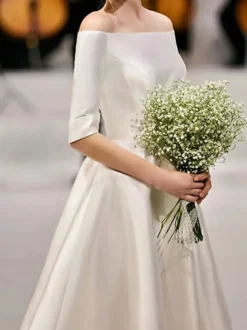 Robe de mariée courte hors de l'épaule demie manche laçage sur dos