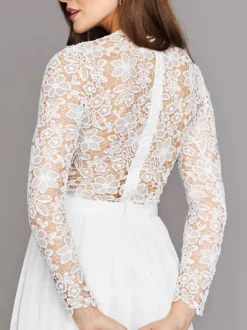 Robe de mariée deux pièces en dentelle avec col bijou et coupe trapèze longueur cheville fermeture éclair manches longues ivoire