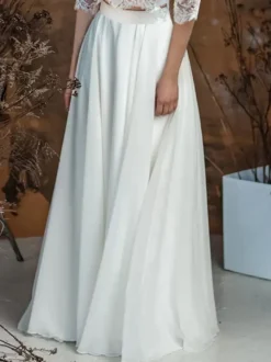 Robe de mariée deux pièces en dentelle Haut col rond demie manche boutonné sur dos jupe en tulle