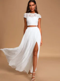 Robe de mariée deux pièces ivoire haut en dentelle col rond manche courte jupe en tulle