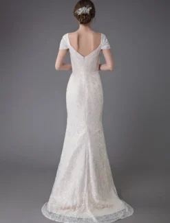 Robe de mariée ivoire en dentelle col en coeur manche courte zip sur dos Robe de mariage