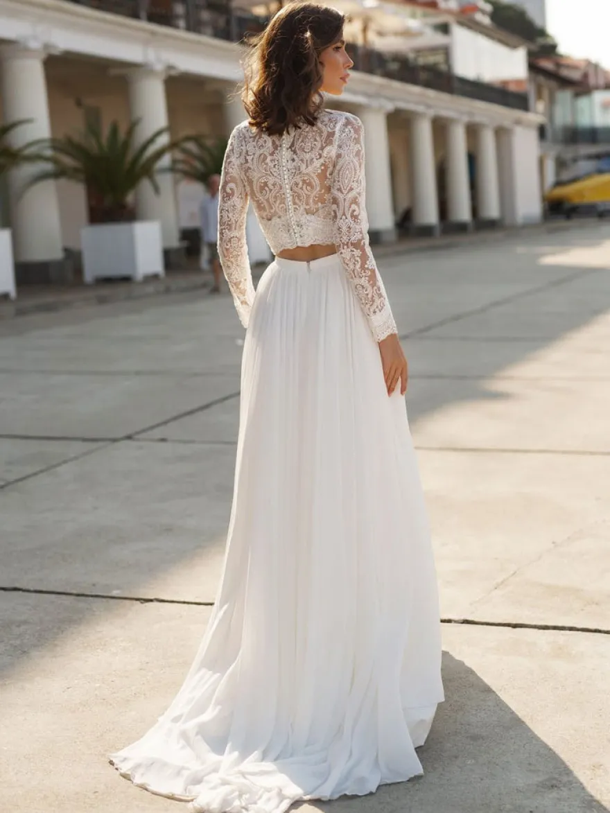Robe de mariée 2 pèces blanche col V manche longue boutonné sur dos en dentelle jupe avec petite traîne
