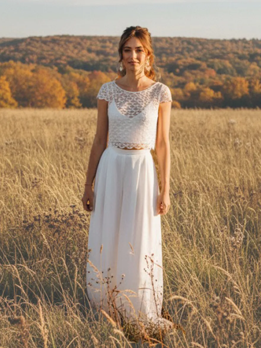 Robe de mariée 3 pièces en dentelle et mousseline décolleté illusion longueur au sol fermeture éclair manches courtes