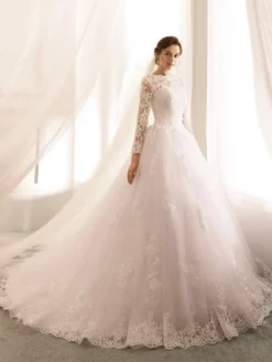 Robe de mariée princess en tulle ivoire manche longue en dentelle boutonné sur dos à traîne ronde Robe de mariage