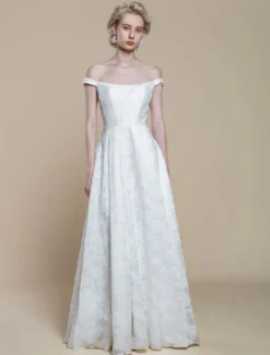 Robe de mariée simple en polyester à col bateau et fleurs en forme de A