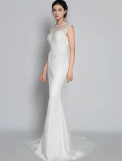 Robe de mariée simple ivoire col rond en dentelle sans manche jupe sirène à traîne Robe de mariage