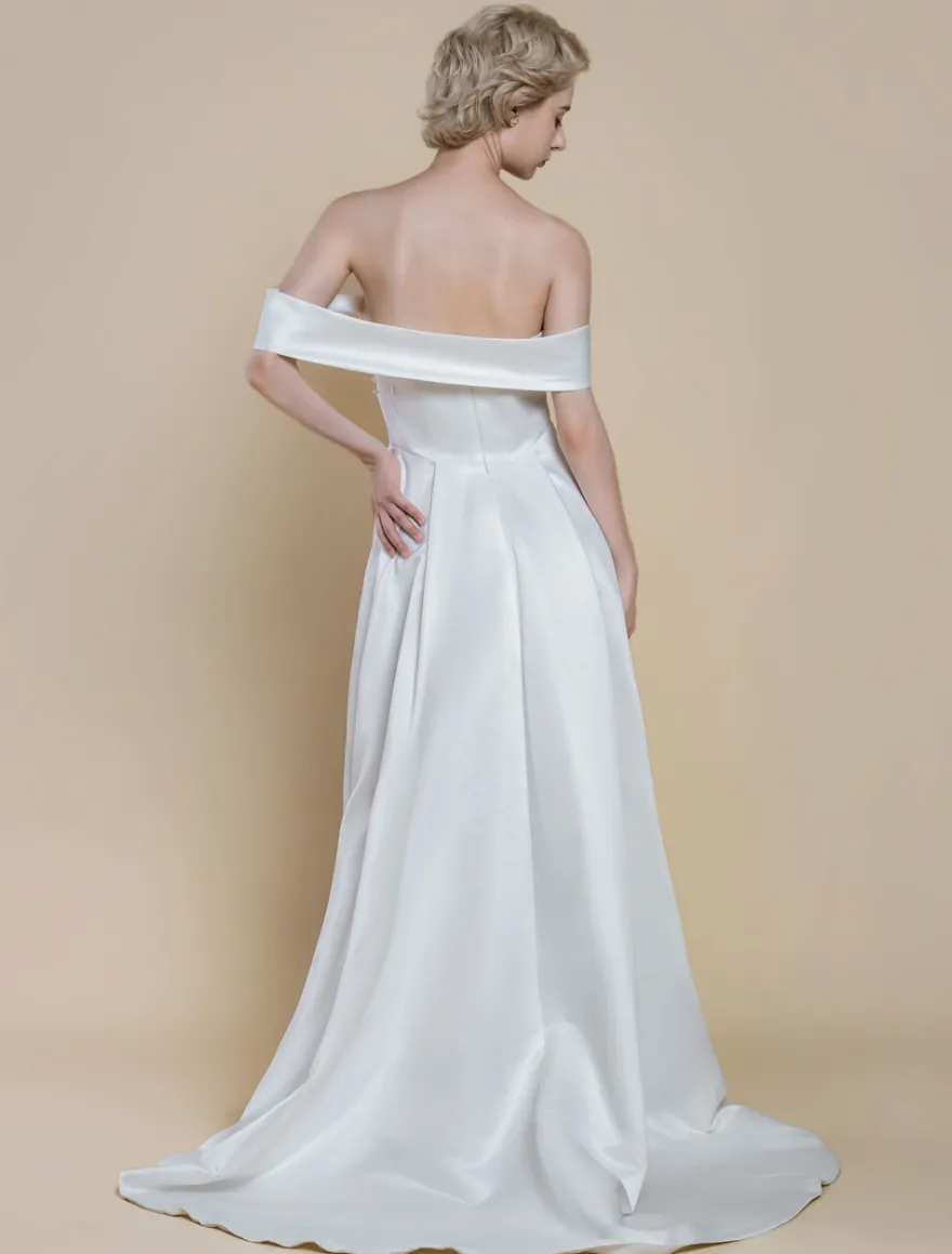 Robe de mariée simple robe de bal décolleté sans manches perles 20 cm