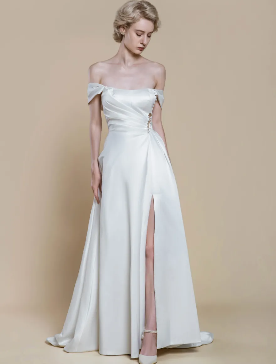 Robe de mariée simple robe de bal décolleté sans manches perles 20 cm
