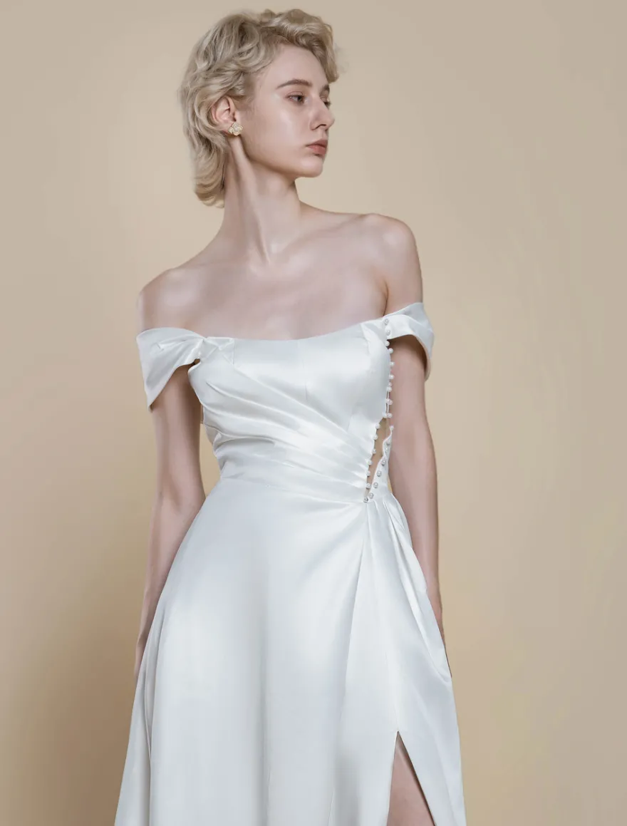 Robe de mariée simple robe de bal décolleté sans manches perles 20 cm