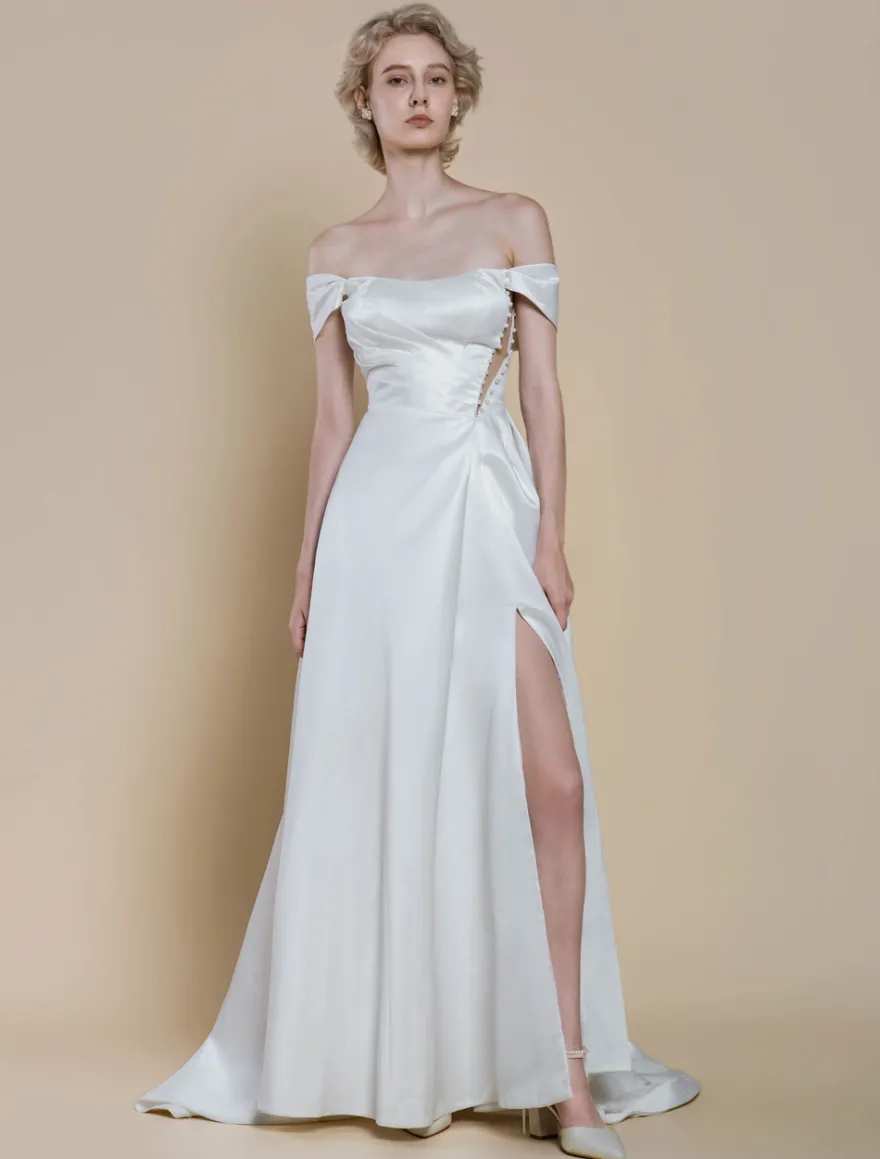 Robe de mariée simple robe de bal décolleté sans manches perles 20 cm