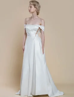 Robe de mariée simple robe de bal décolleté sans manches perles 20 cm