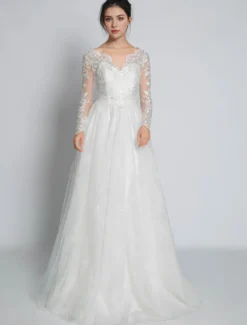 Robe de mariée simple robe de mariage en dentelle col V manche longue transparente décolleté à traîne