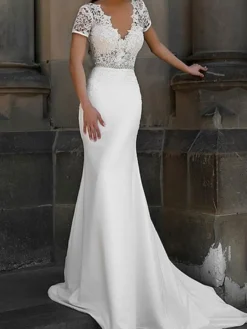 Robe de mariée sirène col V manche courte décoré des boutons sur dos à traîne