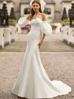 Robe de mariée sirène en satin manches bouffantes boutonné sur dos à traîne