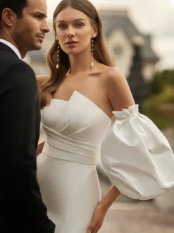 Robe de mariée sirène en satin manches bouffantes boutonné sur dos à traîne