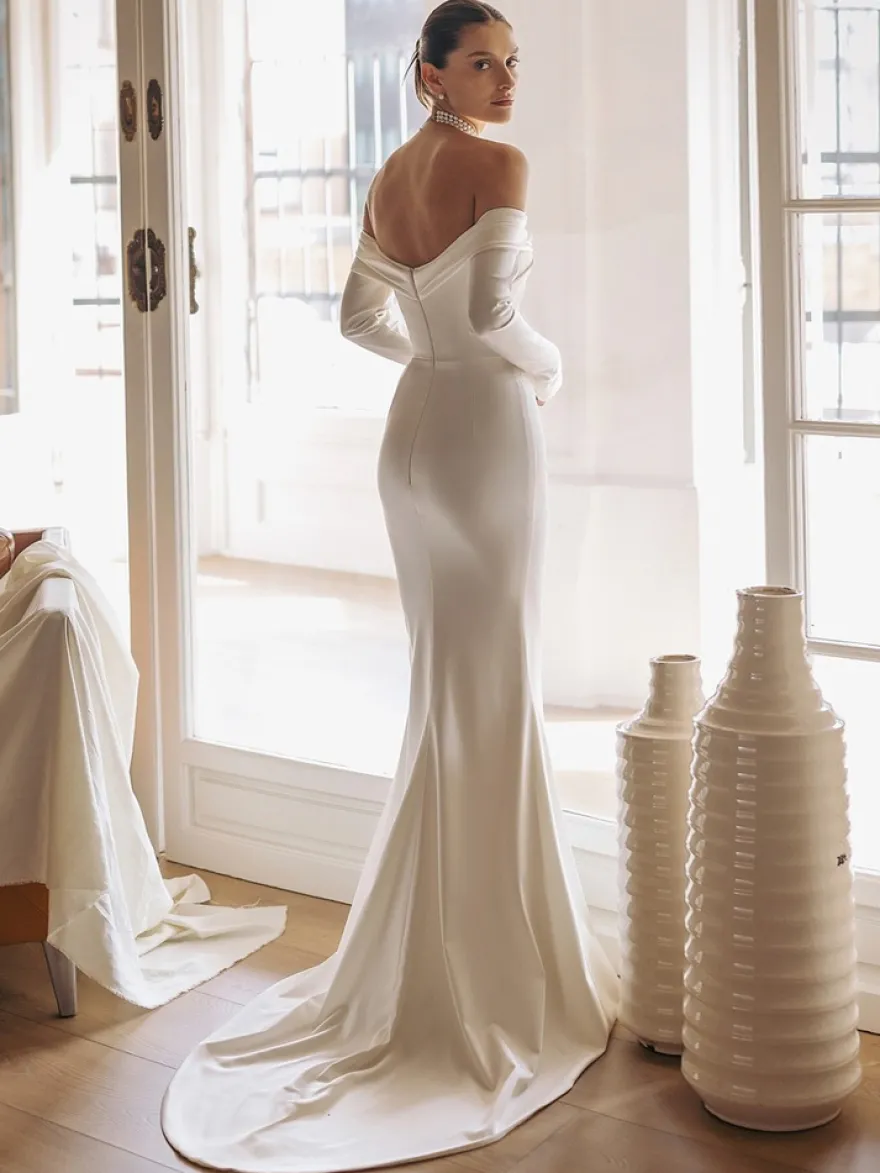 Robe de mariée sirène vintage bustier manche longue zip sur dos à petite traîne