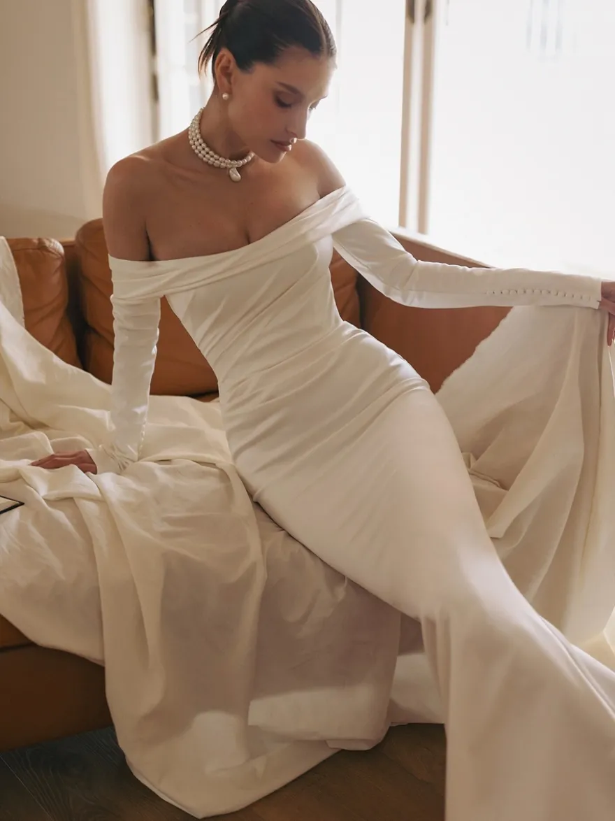 Robe de mariée sirène vintage bustier manche longue zip sur dos à petite traîne