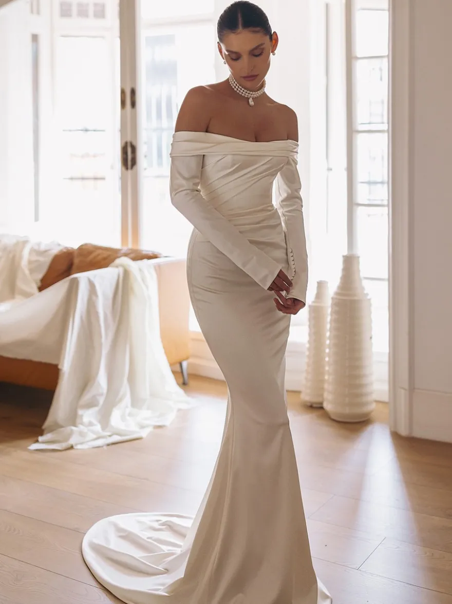 Robe de mariée sirène vintage bustier manche longue zip sur dos à petite traîne