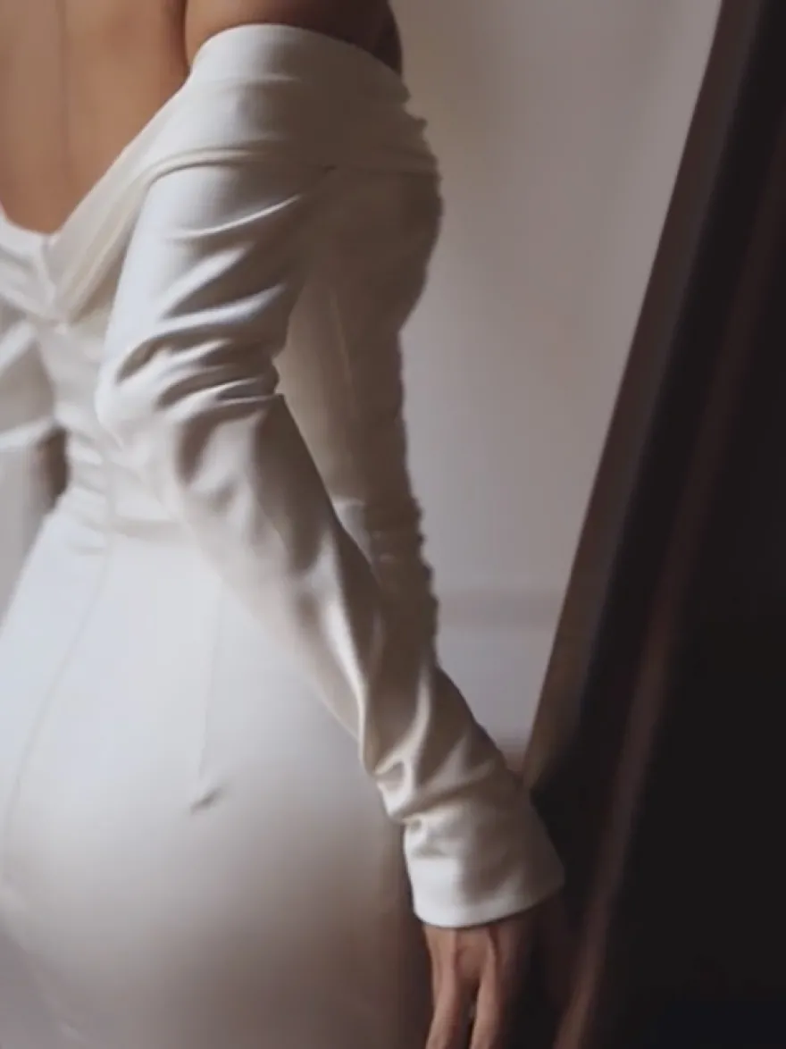 Robe de mariée sirène vintage bustier manche longue zip sur dos à petite traîne