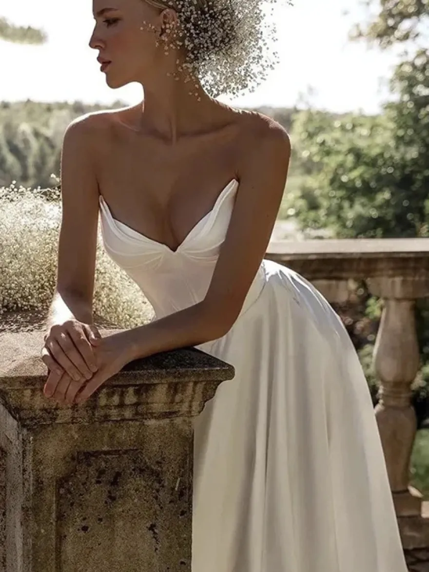 Robe de mariée vintage coupe trapèze décolleté en A sans manches plissée robe de mariée simple