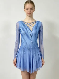 Robe de patinage artistique pour femmes et filles bleue très élastique idéale pour l'entraînement et la compétition. Style classique ornée de cristaux et de strass manches longues.