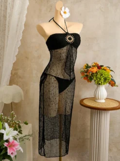 Robe de plage midi dos nu à boutons soleil en maille ajourée transparente